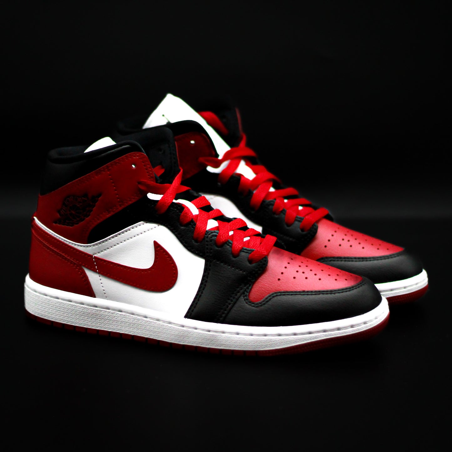 Jordan 1 Mid Black Red